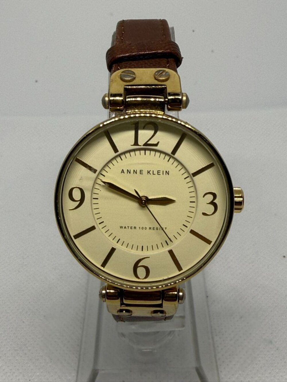 Anne Klein Ladies Gold-Tone Round Watch Cream Dial Roman Numeral Leather 10-9168